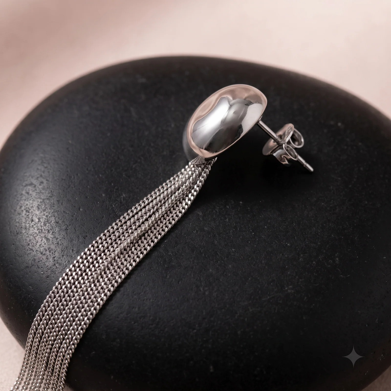 Close-up detail of Oval Dome Fringe Drop Earrings