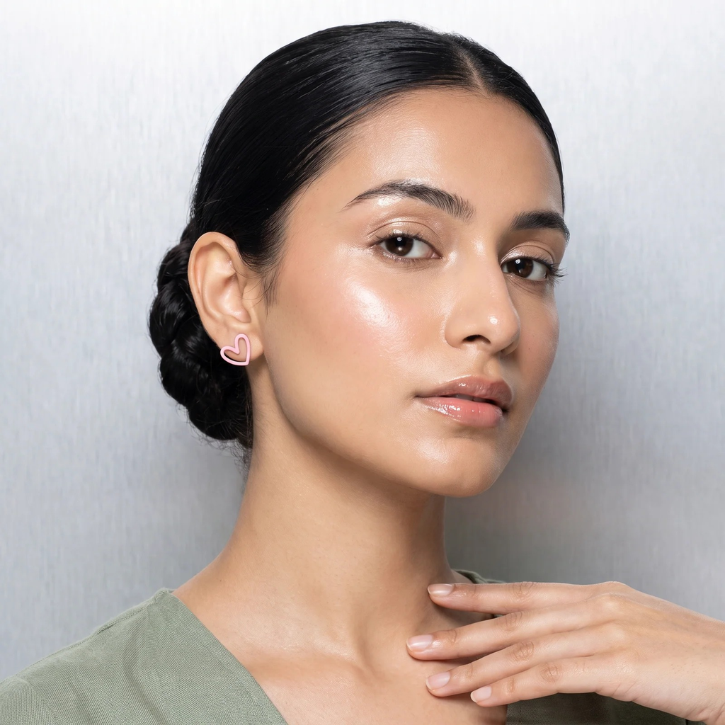 Model wearing Playful Heart & Pavé Stud Duo