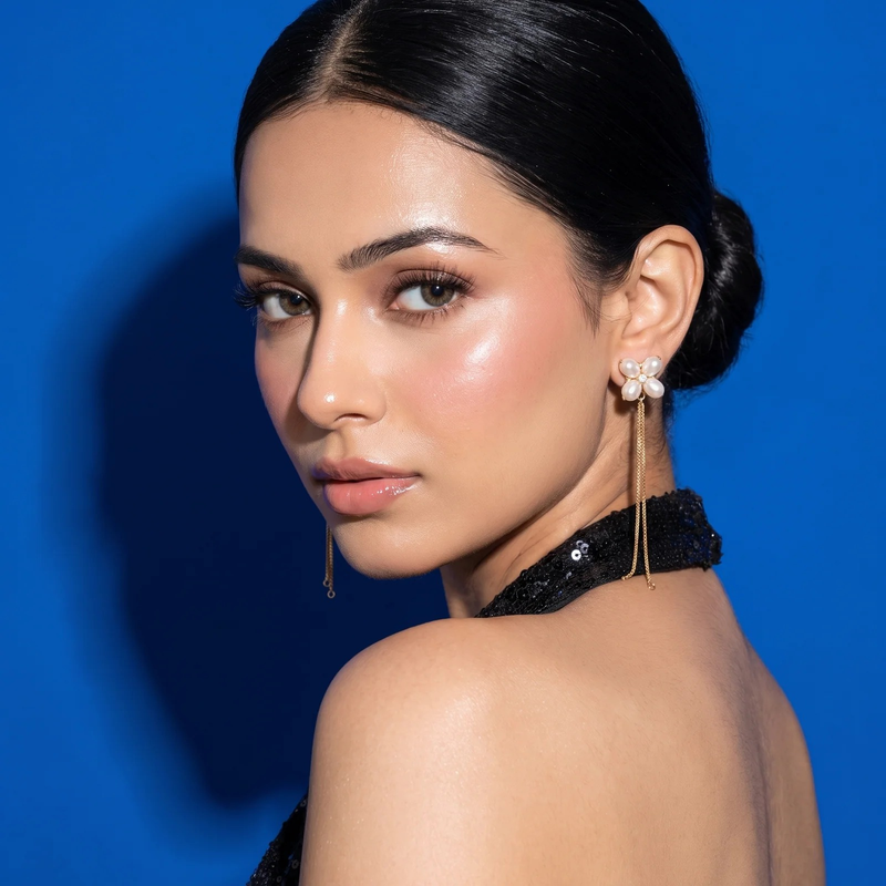 Model wearing Pearl Clover Chain Drop Earrings