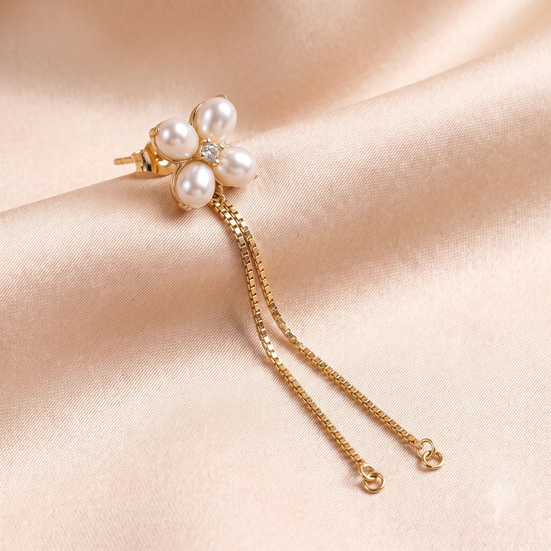 Close-up detail of Pearl Clover Chain Drop Earrings