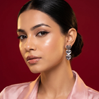 Side profile on ear: Triple Heart Drop Earrings