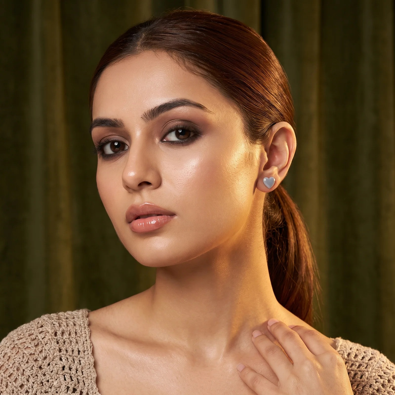 Model wearing Heart & Crystal Mismatched Stud Set