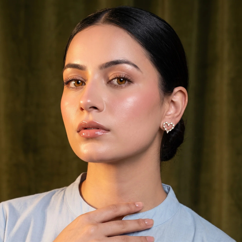 Model wearing Gold Heart Crystal Stud Earrings