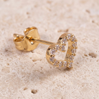 Close-up detail of Gold Heart Crystal Stud Earrings