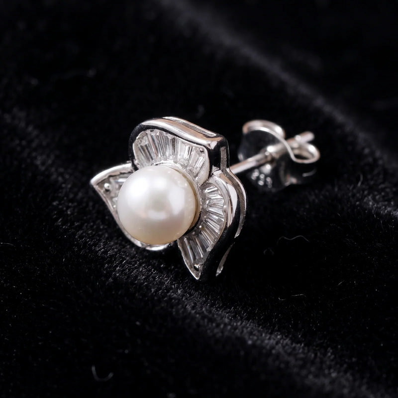 Close-up detail of Pearl & Crystal Flower Stud Earrings