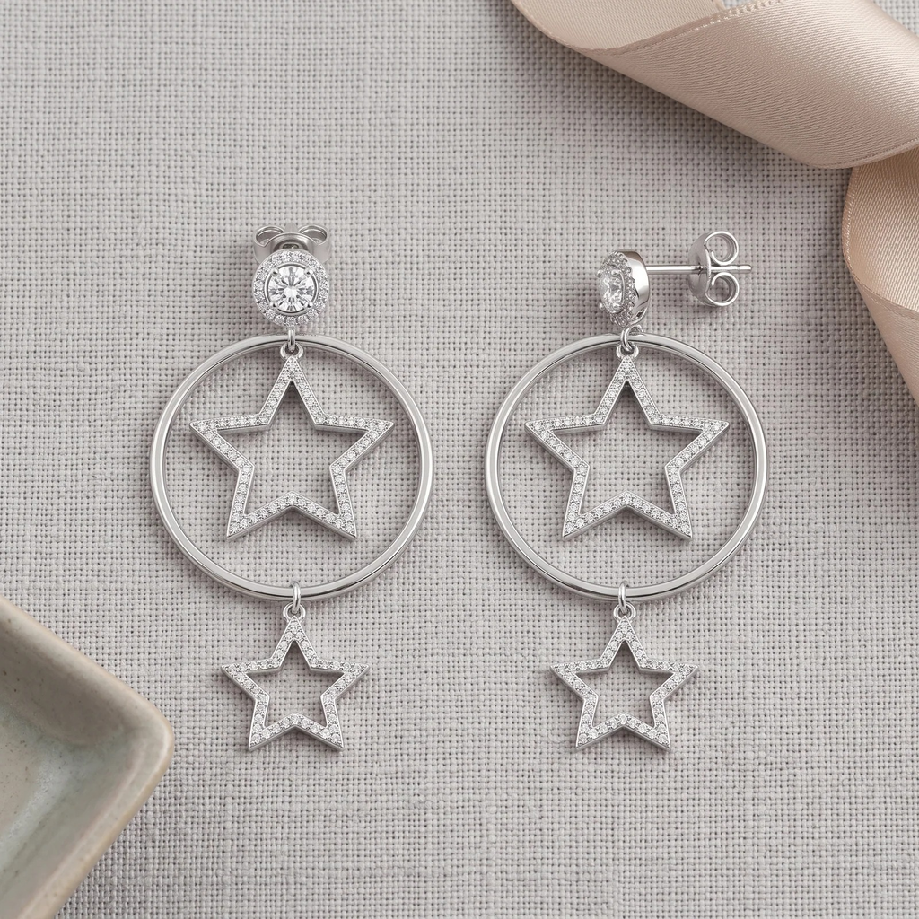 Flat lay of Silver Celestial Star Hoop Drop Earring