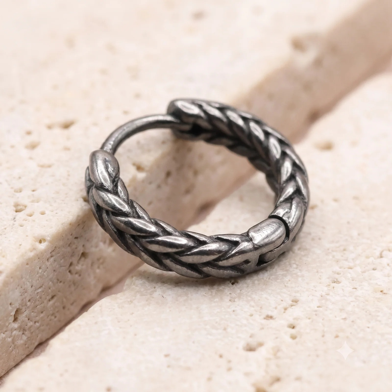 Close-up detail of Zephyr Braid Hoop Earrings
