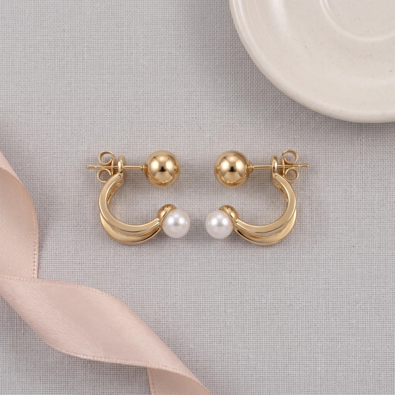 Flat lay of Pearl Cluster Hoop Stud