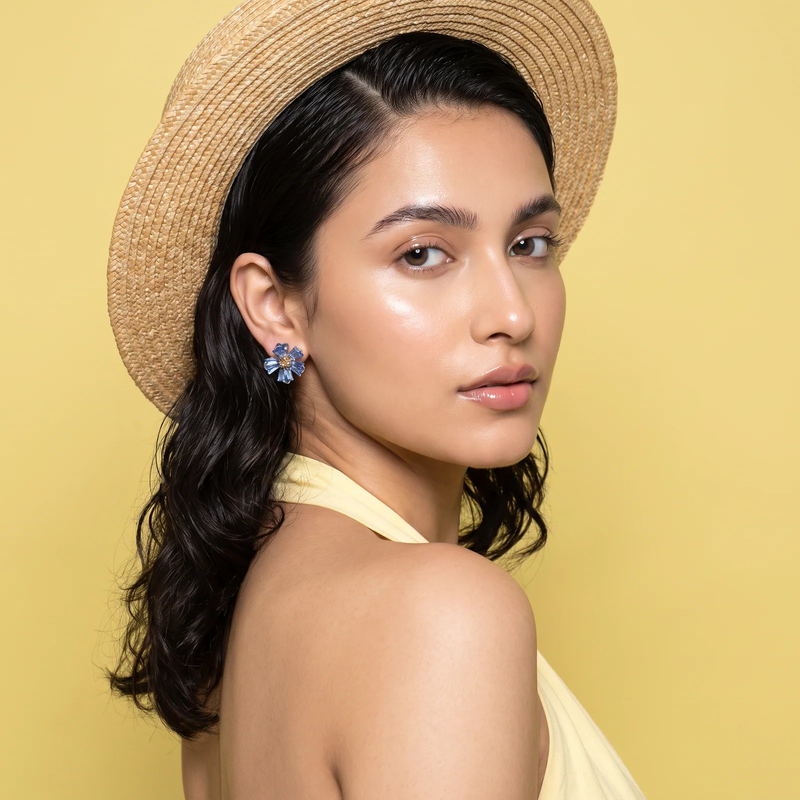 Model wearing Sapphire Crystal Flower Stud Earrings