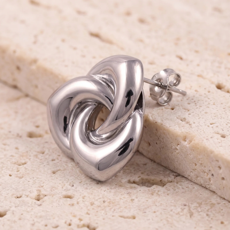 Close-up detail of Chunky Twisted Knot Stud Earrings