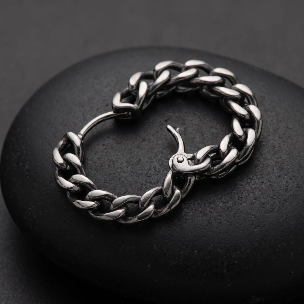 Close-up detail of Silver Woven Chain Huggie Hoop Earrings