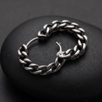 Close-up detail of Silver Woven Chain Huggie Hoop Earrings