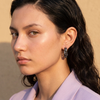 Side profile on ear: Silver Woven Chain Huggie Hoop Earrings