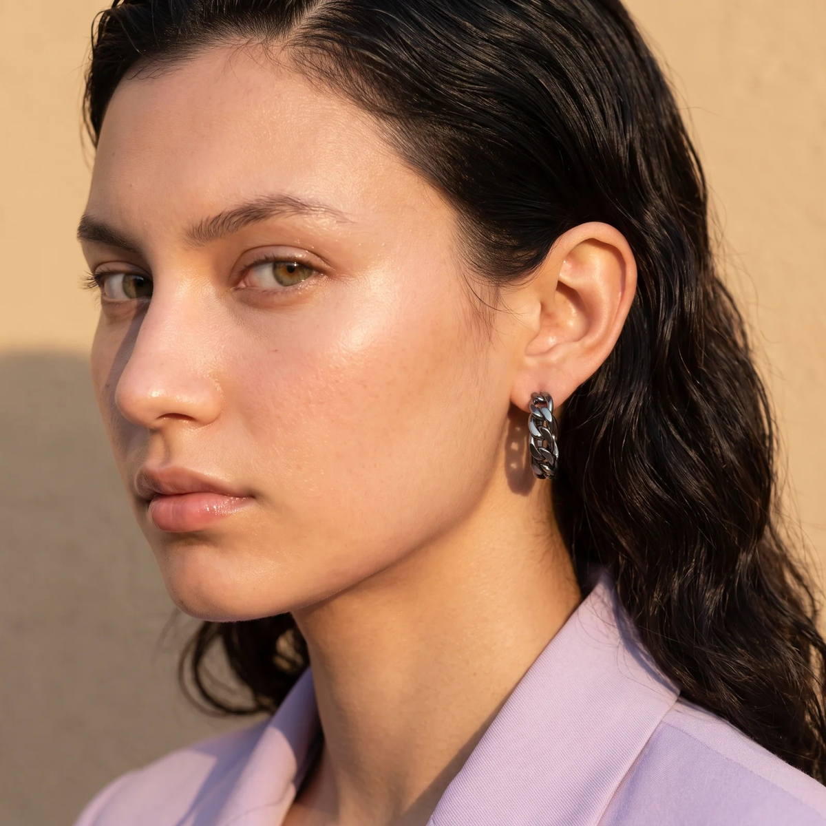 Side profile on ear: Silver Woven Chain Huggie Hoop Earrings