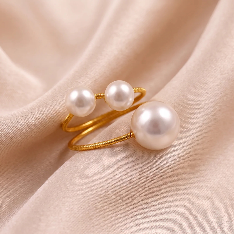 Close-up detail of Triple Pearl Open Ring