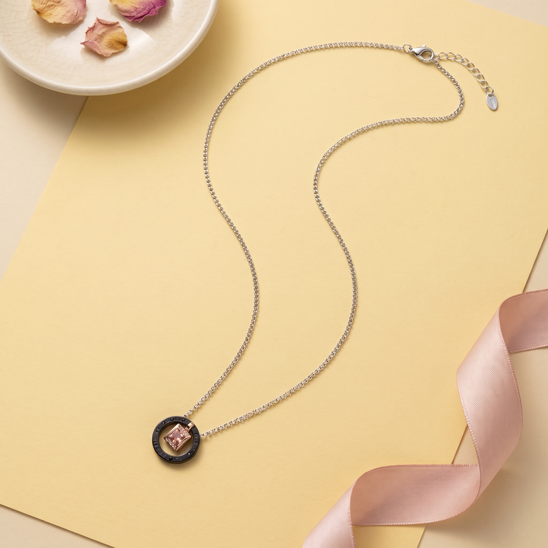 Flat lay of Black Ring Square Pendant Necklace