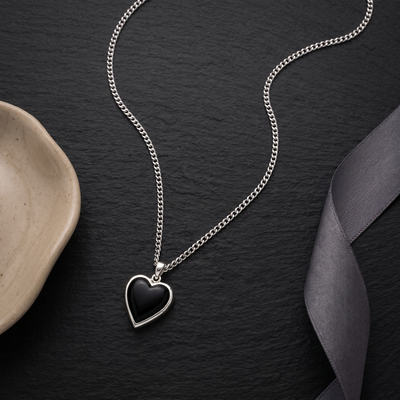 Flat lay of Black Heart Pendant Chain