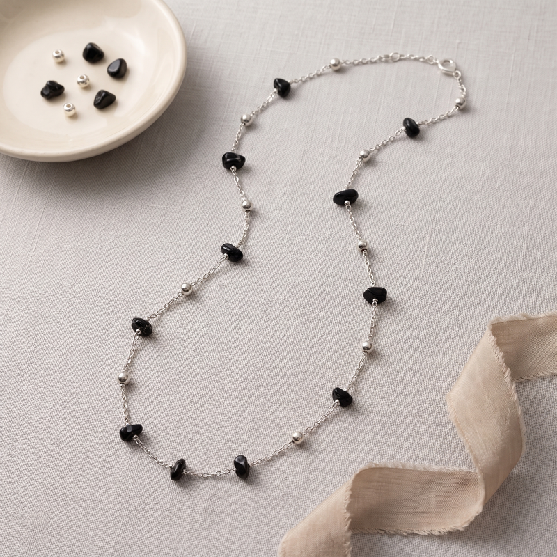 Flat lay of Black Stone Beaded Chain