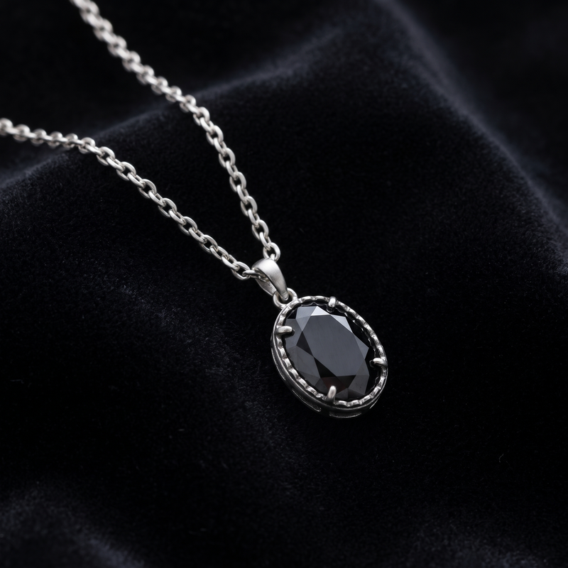 Close-up detail of Black Oval Pendant Chain