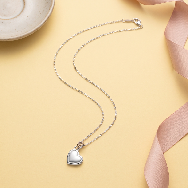 Flat lay of Winter Heart Pendant