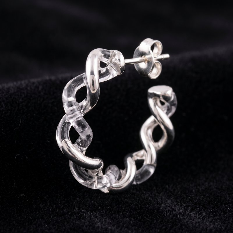 Close-up detail of Silver and Twisted Resin Hoop Earrings