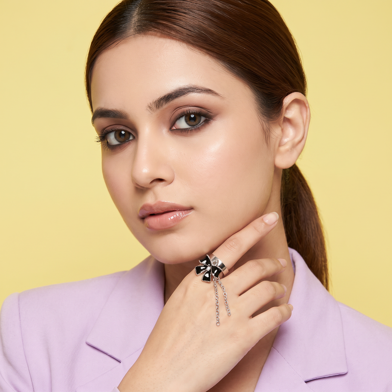 Model wearing Black Bow Draped Chain Ring