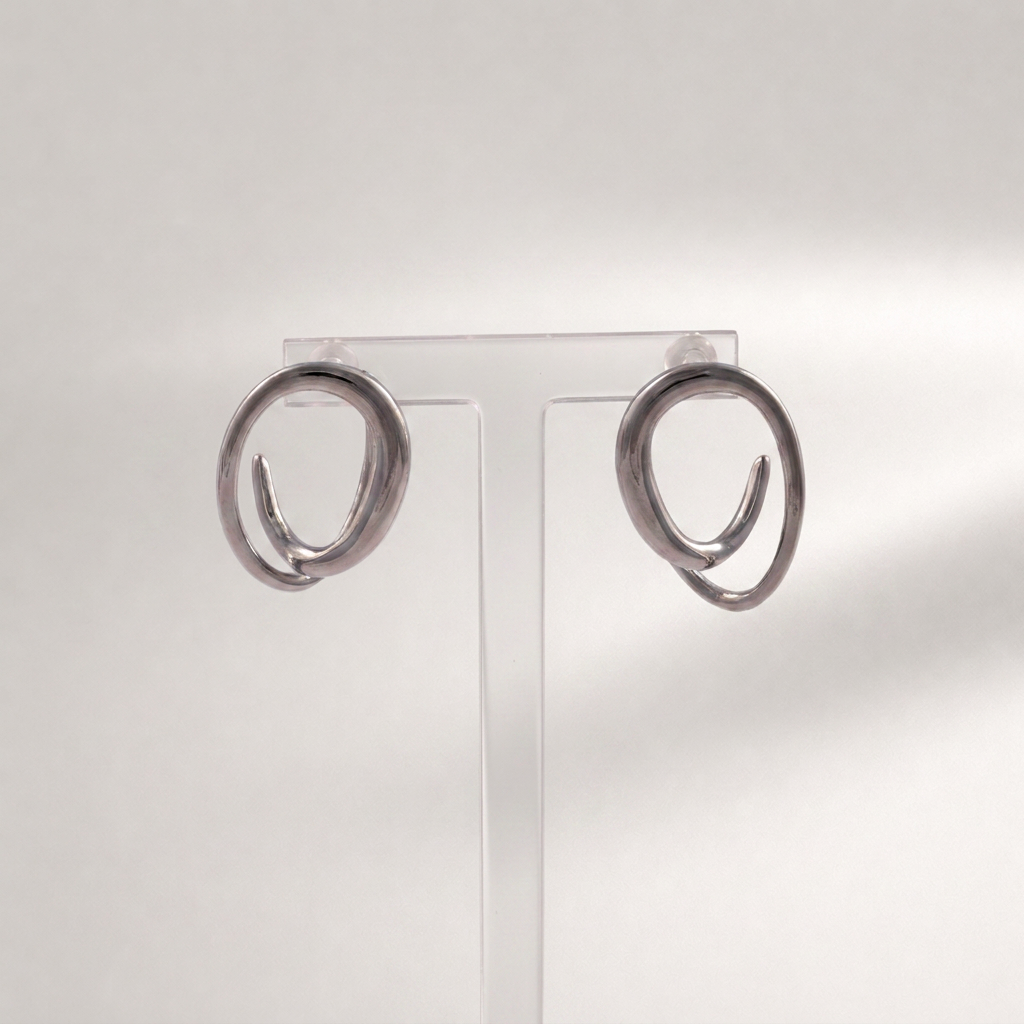 Silver Sculptural Twist Hoop Earrings